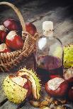 Pomegranate, Juice in Glass, Mortar and Pestle on Wooden Table-ChamilleWhite-Photographic Print