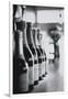 Champagne Bottles in a Row-Walter Bibikow-Framed Photographic Print