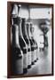 Champagne Bottles in a Row-Walter Bibikow-Framed Photographic Print