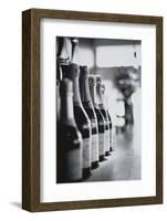 Champagne Bottles in a Row-Walter Bibikow-Framed Photographic Print