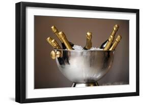 Champagne Bottles in an Ice Bucket-null-Framed Photo