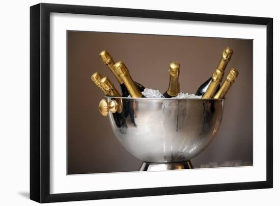 Champagne Bottles in an Ice Bucket-null-Framed Photo