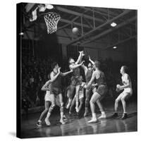 Champion Amateur Phillips 66ers Blocking Out Members of the Opposing Team-Cornell Capa-Stretched Canvas
