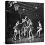 Champion Amateur Phillips 66ers Blocking Out Members of the Opposing Team-Cornell Capa-Stretched Canvas