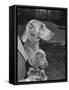 Champion Weimaraner and her 8-week-old male puppy with proud owner Mrs. Harold Goldsmith.-Bernard Hoffman-Framed Stretched Canvas