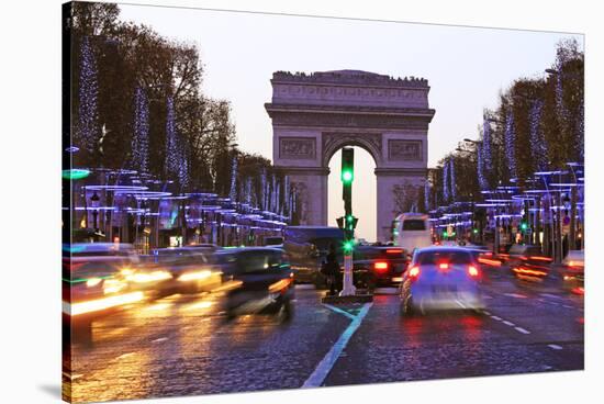 Champs Elysees and Arc de Triomphe at Christmastime, Paris, France, Europe-Hans-Peter Merten-Stretched Canvas