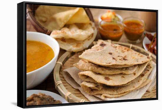 Chapati or Flat Bread, Roti Canai, Indian Food, Made from Wheat Flour Dough. Roti Canai and Curry.-szefei-Framed Stretched Canvas