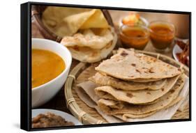 Chapati or Flat Bread, Roti Canai, Indian Food, Made from Wheat Flour Dough. Roti Canai and Curry.-szefei-Framed Stretched Canvas