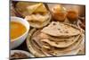 Chapati or Flat Bread, Roti Canai, Indian Food, Made from Wheat Flour Dough. Roti Canai and Curry.-szefei-Mounted Photographic Print