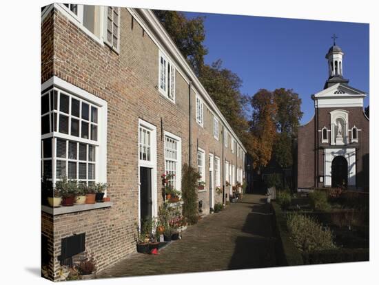 Chapel and Brick Housing Within the Courtyard of the Begijnhof (Beguinage) in Breda, Noord-Brabant,-Stuart Forster-Stretched Canvas