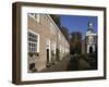 Chapel and Brick Housing Within the Courtyard of the Begijnhof (Beguinage) in Breda, Noord-Brabant,-Stuart Forster-Framed Photographic Print