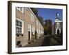 Chapel and Brick Housing Within the Courtyard of the Begijnhof (Beguinage) in Breda, Noord-Brabant,-Stuart Forster-Framed Photographic Print