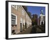 Chapel and Brick Housing Within the Courtyard of the Begijnhof (Beguinage) in Breda, Noord-Brabant,-Stuart Forster-Framed Photographic Print
