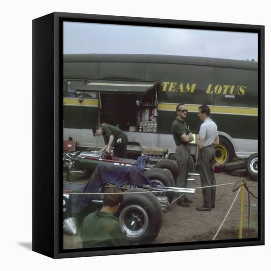 Chapman and Clark Outside the Lotus Team Bus, French Grand Prix, Clermont-Ferrand, France, 1965-null-Framed Stretched Canvas