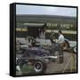 Chapman and Clark Outside the Lotus Team Bus, French Grand Prix, Clermont-Ferrand, France, 1965-null-Framed Stretched Canvas