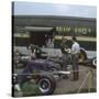 Chapman and Clark Outside the Lotus Team Bus, French Grand Prix, Clermont-Ferrand, France, 1965-null-Stretched Canvas