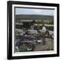 Chapman and Clark Outside the Lotus Team Bus, French Grand Prix, Clermont-Ferrand, France, 1965-null-Framed Photographic Print