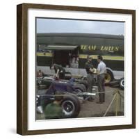 Chapman and Clark Outside the Lotus Team Bus, French Grand Prix, Clermont-Ferrand, France, 1965-null-Framed Photographic Print