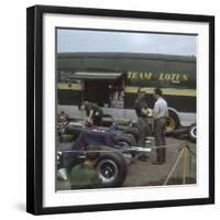 Chapman and Clark Outside the Lotus Team Bus, French Grand Prix, Clermont-Ferrand, France, 1965-null-Framed Photographic Print