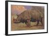 Charging Indian Rhinoceros-null-Framed Art Print