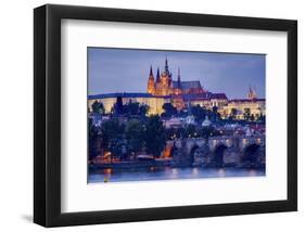 Charles Bridge across Vltava River with Hradcany Quarter and St. Vitus Cathedral in Prague-null-Framed Art Print