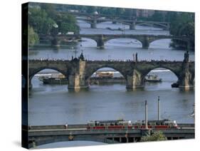 Charles Bridge on the Vltava River, Prague, Czech Republic-Kim Hart-Stretched Canvas