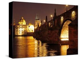 Charles Bridge over the River Vltava at Night, UNESCO World Heritage Site, Prague, Czech Republic,-Hans Peter Merten-Stretched Canvas