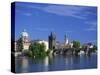 Charles Bridge over the Vltava River and City Skyline of Prague, Czech Republic, Europe-Nigel Francis-Stretched Canvas