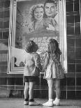 Children Looking at Posters Outside Movie Theater-Charles E^ Steinheimer-Photographic Print