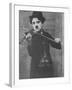 Charlie Chaplin as a Street Musician in The Vagabond-null-Framed Premium Photographic Print