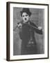 Charlie Chaplin as a Street Musician in The Vagabond-null-Framed Premium Photographic Print