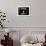 Charlie Chaplin at Dressing Room Mirror, Giving Himself a Wide Grin-W^ Eugene Smith-Framed Premium Photographic Print displayed on a wall