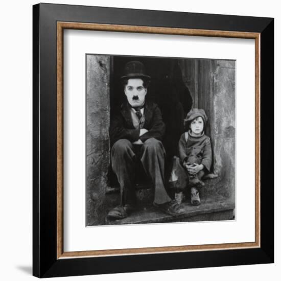 Charlie Chaplin in The Kid-null-Framed Art Print