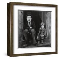 Charlie Chaplin in The Kid-null-Framed Art Print