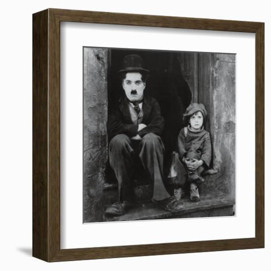 Charlie Chaplin in The Kid-null-Framed Art Print