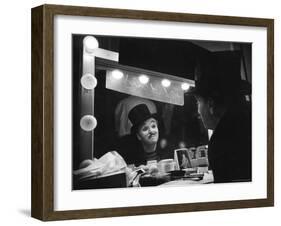 Charlie Chaplin Looking Into Mirror, Putting on Makeup for Role as the Animal Trainer-W^ Eugene Smith-Framed Premium Photographic Print