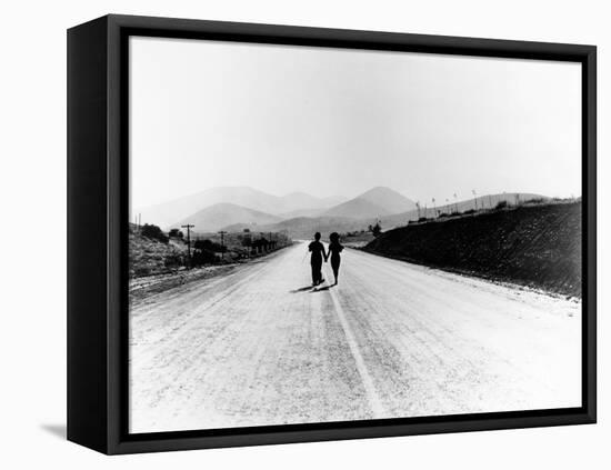 Charlie Chaplin, Paulette Goddard. "The Masses" 1936, "Modern Times" Directed by Charles Chaplin-null-Framed Stretched Canvas