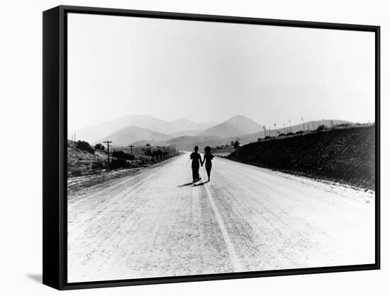 Charlie Chaplin, Paulette Goddard. "The Masses" 1936, "Modern Times" Directed by Charles Chaplin-null-Framed Stretched Canvas