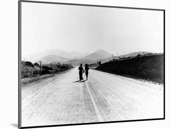 Charlie Chaplin, Paulette Goddard. "The Masses" 1936, "Modern Times" Directed by Charles Chaplin-null-Mounted Photographic Print