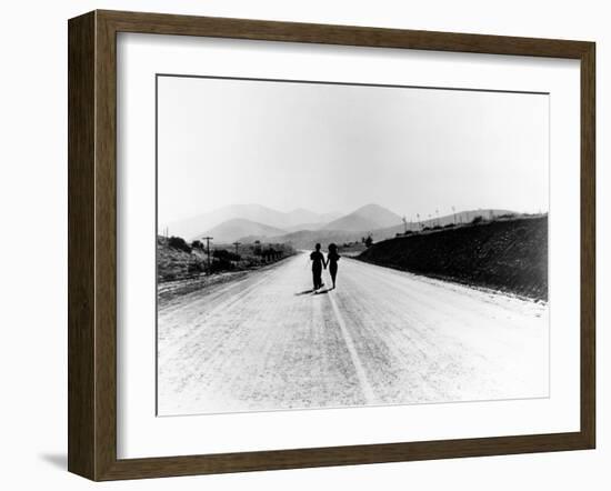 Charlie Chaplin, Paulette Goddard. "The Masses" 1936, "Modern Times" Directed by Charles Chaplin-null-Framed Photographic Print