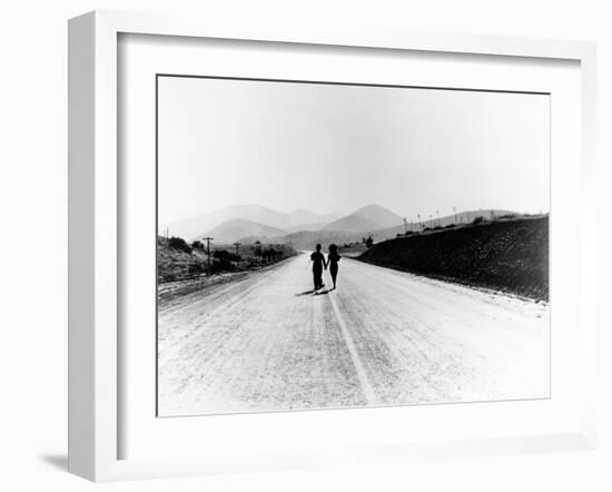 Charlie Chaplin, Paulette Goddard. "The Masses" 1936, "Modern Times" Directed by Charles Chaplin-null-Framed Photographic Print