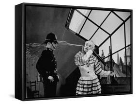 Charlie Chaplin Squirting Water Into Face of Policeman, Scene from Limelight-W^ Eugene Smith-Framed Stretched Canvas