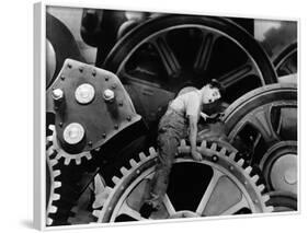 Charlie Chaplin. "The Masses" 1936, "Modern Times" Directed by Charles Chaplin-null-Framed Photographic Print