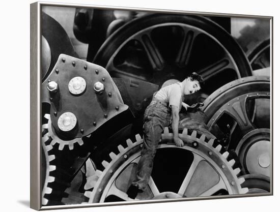 Charlie Chaplin. "The Masses" 1936, "Modern Times" Directed by Charles Chaplin-null-Framed Photographic Print