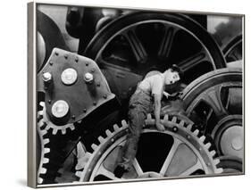 Charlie Chaplin. "The Masses" 1936, "Modern Times" Directed by Charles Chaplin-null-Framed Photographic Print