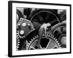 Charlie Chaplin. "The Masses" 1936, "Modern Times" Directed by Charles Chaplin-null-Framed Photographic Print