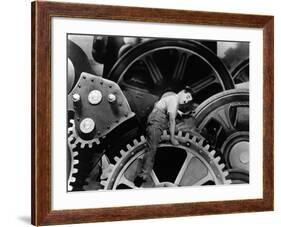 Charlie Chaplin. "The Masses" 1936, "Modern Times" Directed by Charles Chaplin-null-Framed Photographic Print