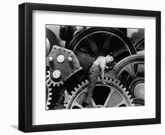 Charlie Chaplin. "The Masses" 1936, "Modern Times" Directed by Charles Chaplin-null-Framed Photographic Print