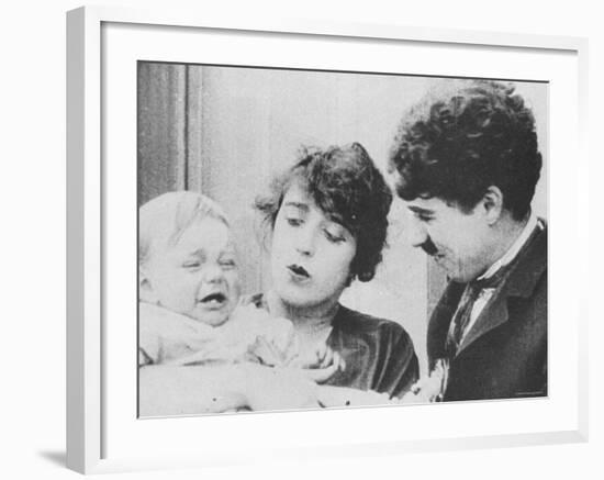 Charlie Chaplin with Mabel Normand in "His Trysting Place."-null-Framed Premium Photographic Print