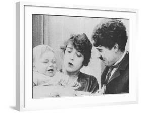 Charlie Chaplin with Mabel Normand in "His Trysting Place."-null-Framed Premium Photographic Print